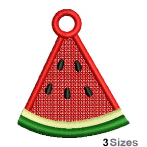 May include: Red watermelon slice with black seeds and a green rind. The watermelon slice has a loop at the top, making it a charm or ornament.