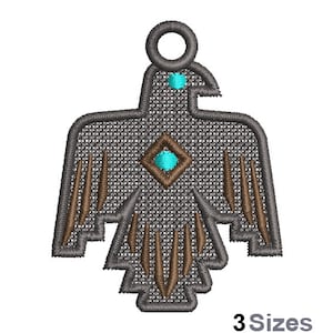 May include: Gray stylized embroidery design of an eagle with brown accents and turquoise gemstones. The design has a loop at the top for hanging.