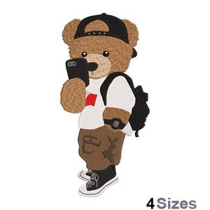 May include: A brown teddy bear wearing a black baseball cap, a white t-shirt with a red logo, and a black backpack. The bear is holding a black smartphone and has brown cargo pants and black sneakers.