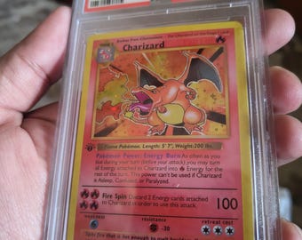 charizard pokemon card first edition psa 10 Pokmon TCG Holy Grail: PSA 10 1st Edition Charizard Hits Auction