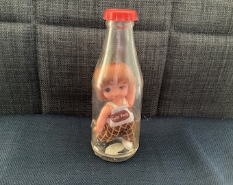 Vintage Cute Cola Kids Doll Sealed in Plastic Pop Bottle with Red Lid
