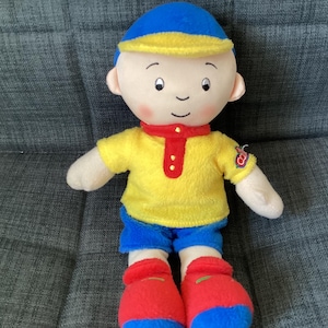 Liten, klassisk och 25 cm Caillou-gosedjursdocka från Import Dragon