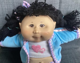 Vintage or Retired 2000s Play Along Toys Cabbage Patch Kids Black Yarn Haired Girl with Brown Almond Eyes, Blue Velour Tracksuit