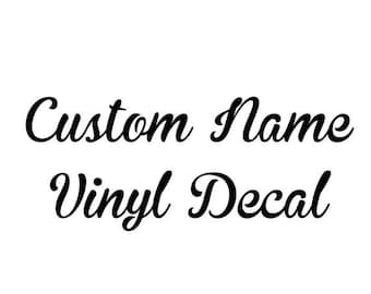 May include: Custom Name Vinyl Decal, a black and white image with the text "Custom Name Vinyl Decal" in a cursive font.
