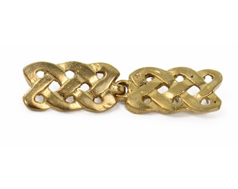 Viking coat clasp knot pattern