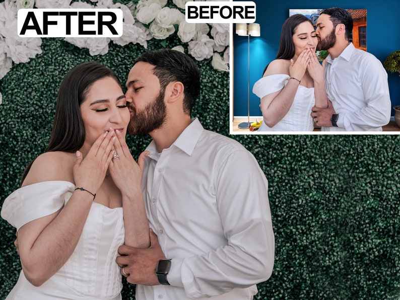 May include: A couple in formal attire, the woman in a white off-the-shoulder dress, the man in a white button-down shirt, embrace in front of a green hedge wall. The woman covers her mouth with her hands as the man kisses her cheek.