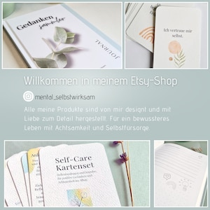 May include: A collection of self-care products featuring a journal with the text "Gedanken Sammler" and a set of cards with the text "Self-Care Kartenset". The products are designed to promote mindfulness and self-care.