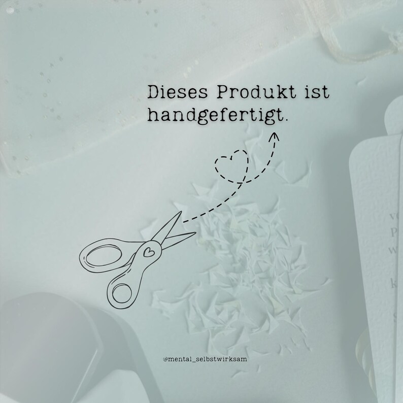 May include: A light blue image with the text "Dieses Produkt ist handgefertigt." A pair of scissors with a heart design is cutting paper, with a dotted line and heart shape above. The image also includes the text "@mental_selbstwirksam."