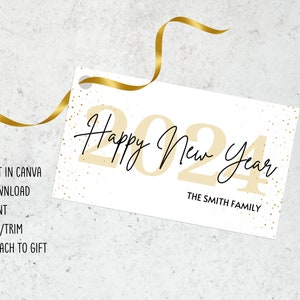 May include: A white gift tag with gold glitter and the text "Happy New Year 2024" in black and gold. The tag also includes the text "THE SMITH FAMILY" in black. Instructions for editing, downloading, printing, cutting, and attaching the tag to a gift are listed on the left side of the tag.