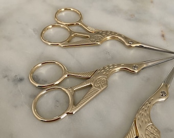 Golden scissors in the form of a stork | engagement scissors