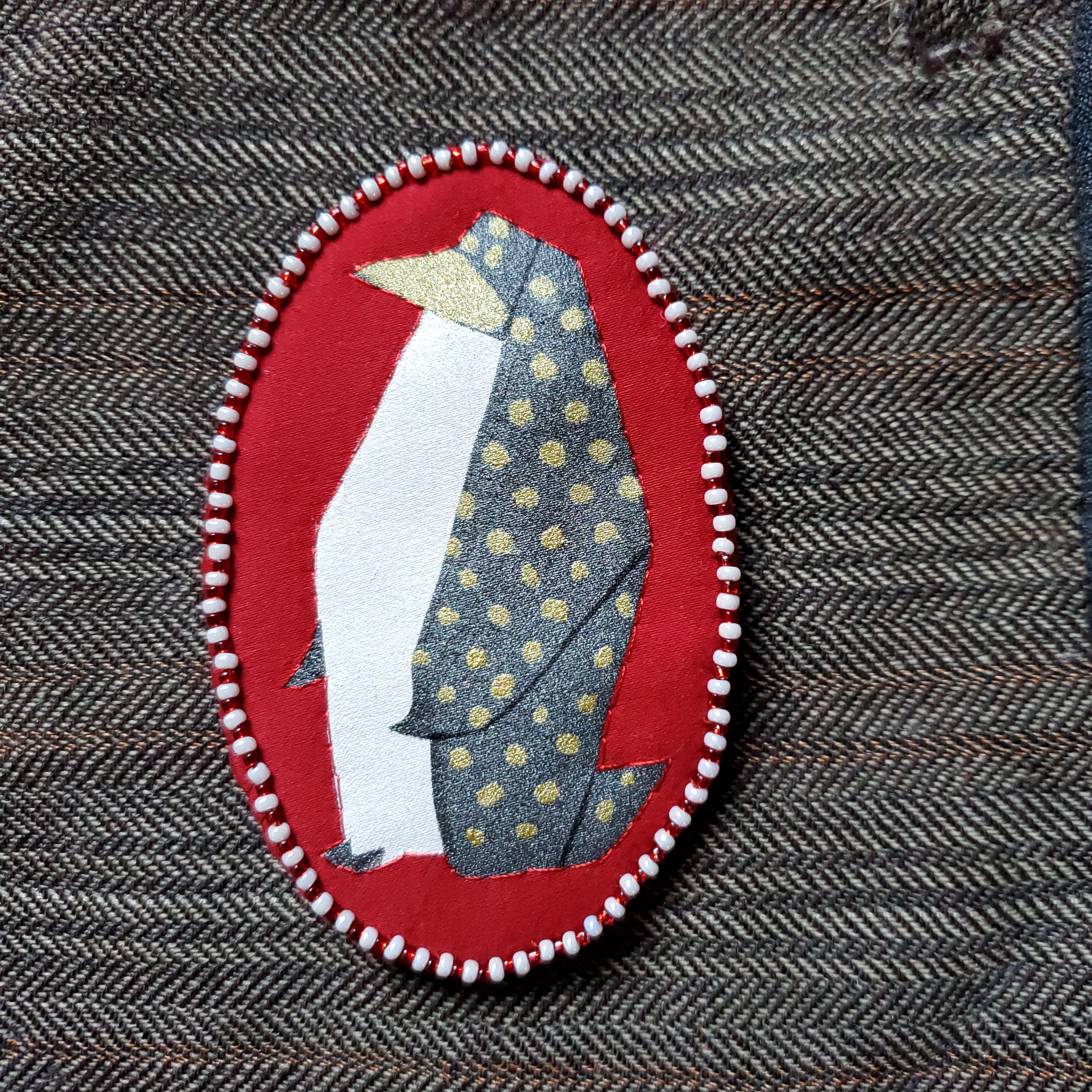 Gotham Penguins Eat Fish pin red/white