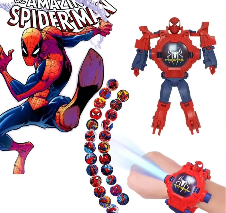 May include: A red and blue transforming Spider-Man watch with a projector that displays images of Spider-Man. The watch has a red wristband and a black face with a Spider-Man logo. The watch transforms into a robot with red and blue arms and legs.