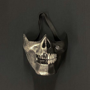 Maschera da zombi di Halloween a mezzo teschio