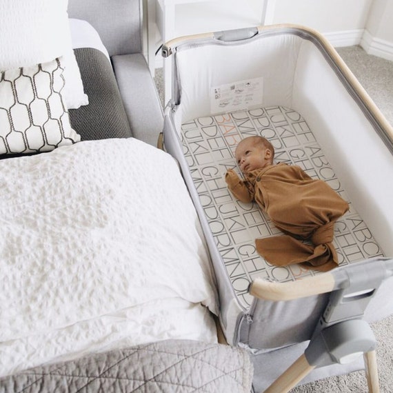 Alphabet crib best sale bedding
