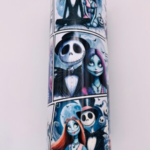 May include: A white tumbler with a colorful graphic print of Jack Skellington and Sally from the Nightmare Before Christmas. The print features multiple scenes of the couple in different poses.