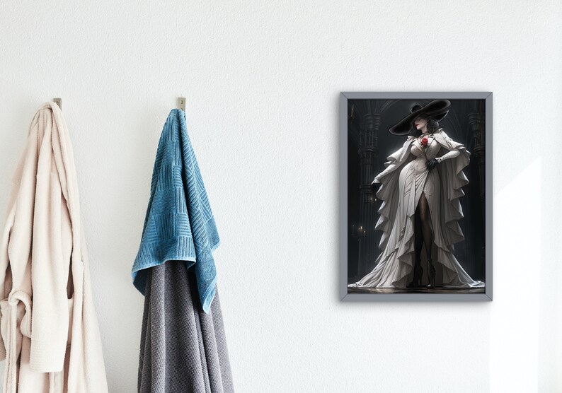 May include: A framed illustration of a woman in a white gown and a black hat, standing in a dark, gothic setting. She is holding a red rose in her hand.
