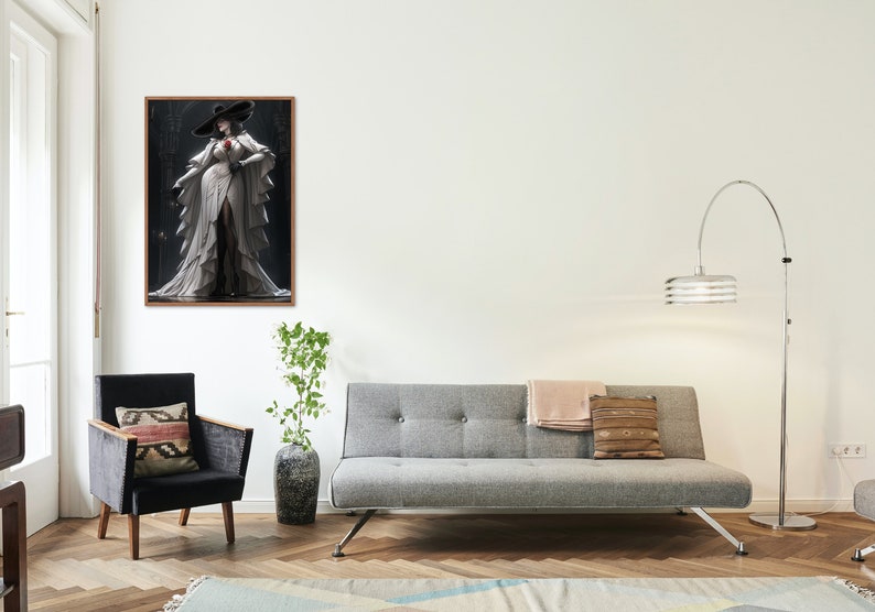 May include: A living room interior with a gray sofa, a black armchair, a potted plant, and a floor lamp with a white shade. A framed print of a woman in a white dress and a black hat hangs on the wall.