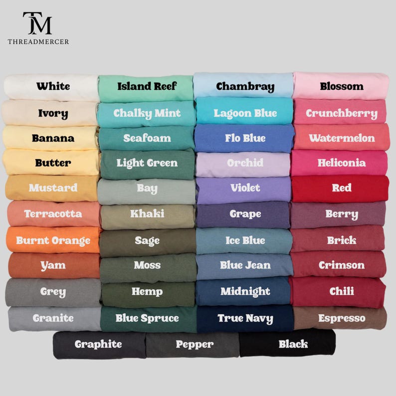 May include: A display of folded fabric in various colors, including white, blue, pink, and green. Each stack is labeled with its color name, such as "White," "Chambray," and "Blossom." The "THREADMERCER" logo is visible in the top left corner.