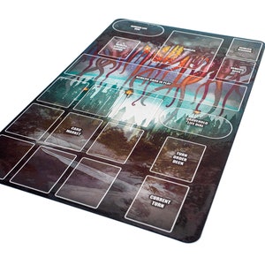 May include: Rectangular game mat with a dark, illustrated design. The mat features various labeled areas for cards and game components, including "Card Market" and "Turn Order Deck." The artwork depicts a forest scene with orange tentacles.