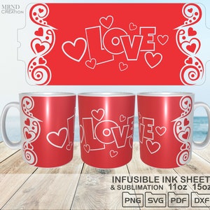 May include: Red sublimation blank mugs with a white design of the word "LOVE" with hearts. The design is for 11oz and 15oz mugs.  The design is also available as an infusible ink sheet.