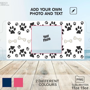 May include: A sublimation design template featuring a white background with black paw prints and bone designs. The template has a space for a photo and the text "Your Photo". The design is available in two colors: navy blue and pink. The template is for 11oz and 15oz sublimation mugs.
