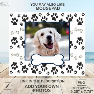 May include: A white mousepad with a black paw print pattern and a bone design. The mousepad has a photo frame with a golden retriever dog inside. The text "YOU MAY ALSO LIKE MOUSEPAD" is at the top of the image. The text "LINK IN THE DESCRIPTION ADD YOUR OWN PHOTOS" is at the bottom of the image. The text "PNG SUBLIMATION 9.25" x 7.75" is at the bottom right of the image.