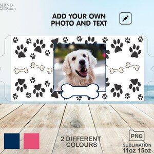 May include: A sublimation design template for a 11oz or 15oz tumbler featuring a white background with black paw prints and bone designs. The template includes a space for a photo and text. The design is available in two colors: navy blue and pink.