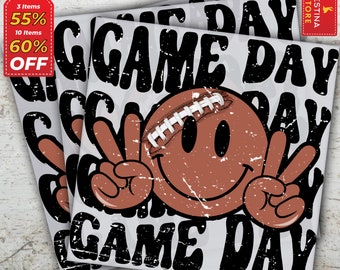 May include: Three black and white stickers with the text "Game Day" and a brown smiley face football. The football has white stitching and a peace sign on each side.