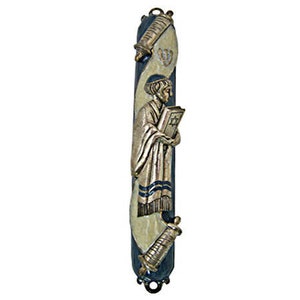 May include: A decorative mezuzah with a blue and white background. The mezuzah features a gold-colored figure of a person holding a scroll. The scroll has the Hebrew word "Shabbat" written on it.