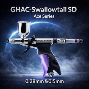 May include: A silver and black airbrush with a purple trigger and accents. The airbrush has a small paint reservoir and the text "GHAC-Swallowtail SD Ace Series" is displayed at the top. The text "0.28mm & 0.5mm" is displayed at the bottom.