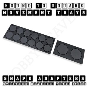 May include: Two black plastic trays with round indentations. The larger tray has 10 indentations and the smaller tray has 2 indentations. The trays are labeled "Round to Square Movement Trays" and "Shape Adapters".
