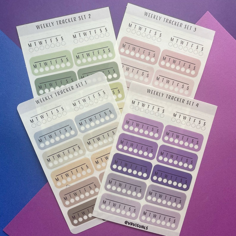 May include: Four sheets of weekly tracker stickers with different color schemes. Each sheet has eight stickers with the days of the week labeled MTWTFSS. The stickers are in shades of green, blue, pink, and purple.