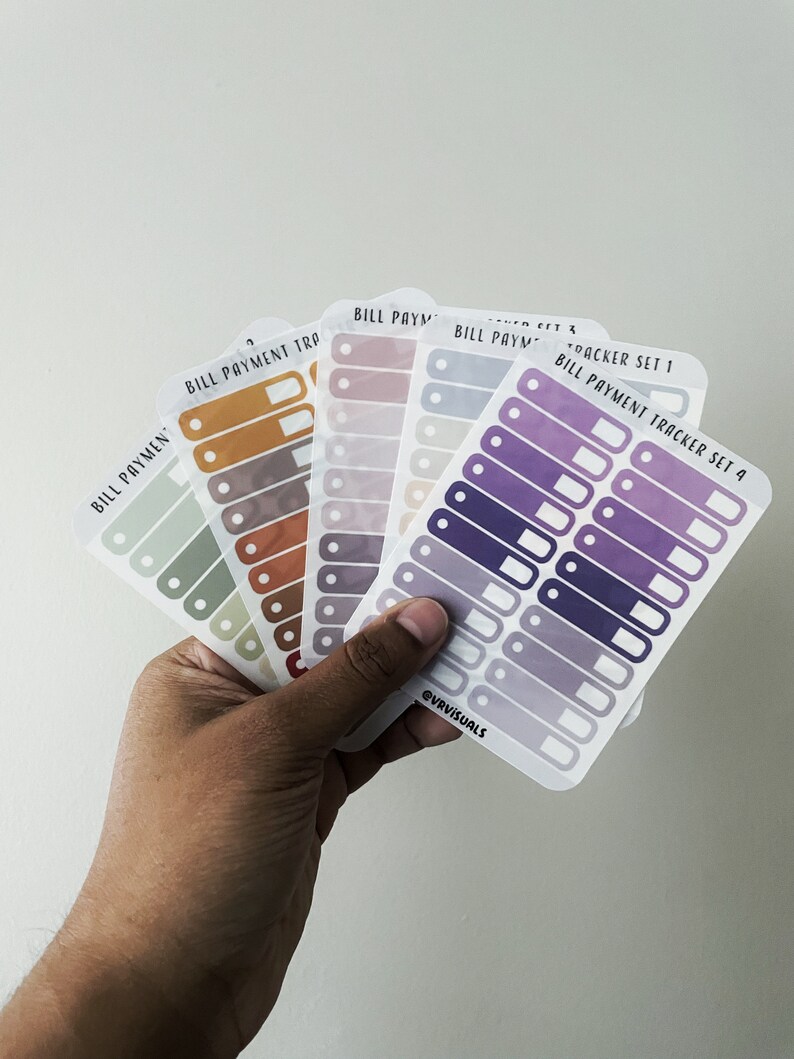 May include: A set of five colorful bill payment tracker stickers with the text "BILL PAYMENT TRACKER SET 4" and "EVRVISUALS".