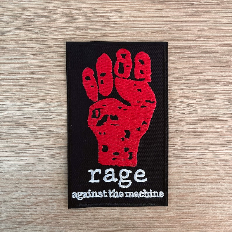 rage against the machine embroidered patch with a red raised fist logo