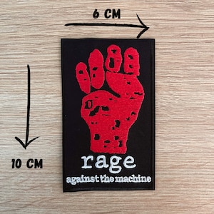 rage against the machine embroidered patch with a red raised fist logo