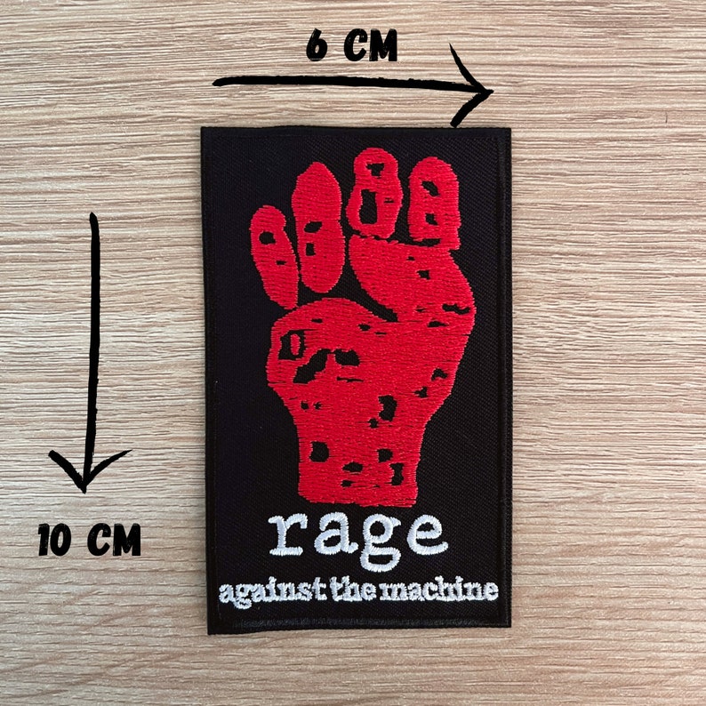 rage against the machine embroidered patch with a red raised fist logo