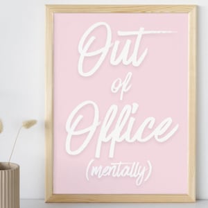 May include: A framed print with a light pink background and the words "Out of Office (mentally)" in white script. The frame is made of light-colored wood. The words "Instant Download" and a downward arrow are at the bottom.
