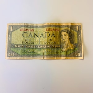 1954 Canadian One Dollar Bill, featuring Queen Elizabeth II.