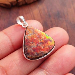Rare Ammolite Pear Pendant: Red Gemstone, Sterling Silver Jewelry