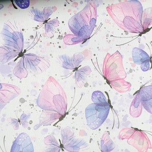 May include: A seamless pattern of watercolour butterflies in shades of pink and purple on a white background. The butterflies are arranged in a random pattern and are overlapping each other.