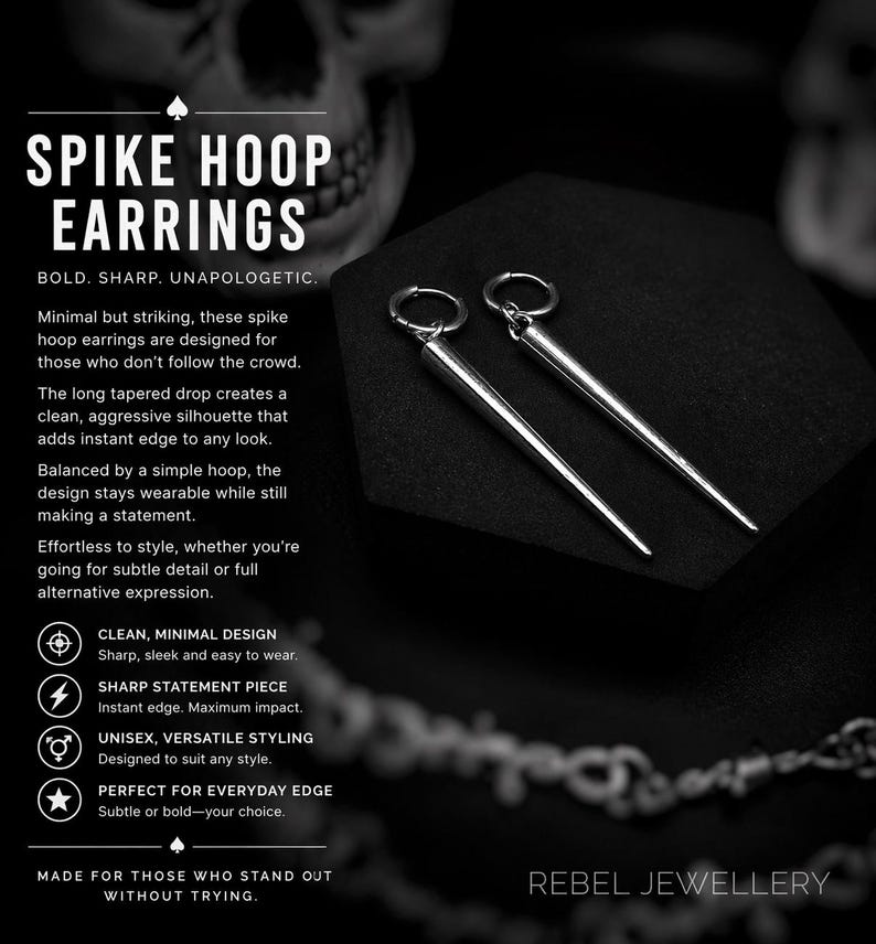 May include: Silver spike hoop earrings. The earrings have a long, tapered drop design. The text on the image says "SPIKE HOOP EARRINGS" and "REBEL JEWELLERY". The earrings are designed for those who don't follow the crowd.