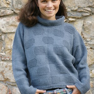CIMINNA, knitting pattern for wide pullover in wool for ladies. The pattern is available in English.