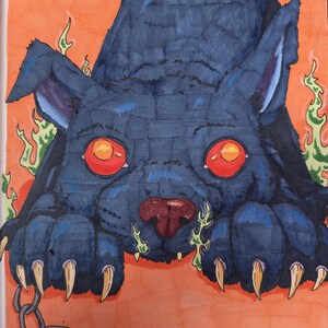 May include: A marker drawing of a dark blue creature with glowing red eyes, sharp yellow claws, and a broken chain on one paw. The creature is surrounded by green flames against a bright orange background, with the text 9-30-26 Koko in the corner.