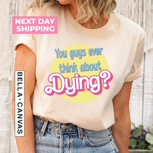 Camiseta "Vocês já pensaram em morrer?", "Casa dos sonhos", "Vamos lá", "Camiseta engraçada", "Presente para ela", "Camiseta cowgirl", "Camiseta para meninas"