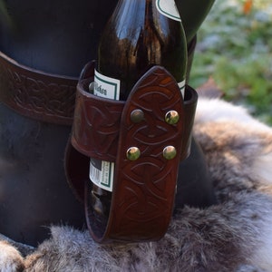 Leather beer bottle and beer can holder for the belt. Leather holder for beer cups.
