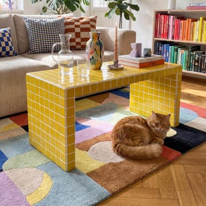 Betegelde salontafel, Vividus M