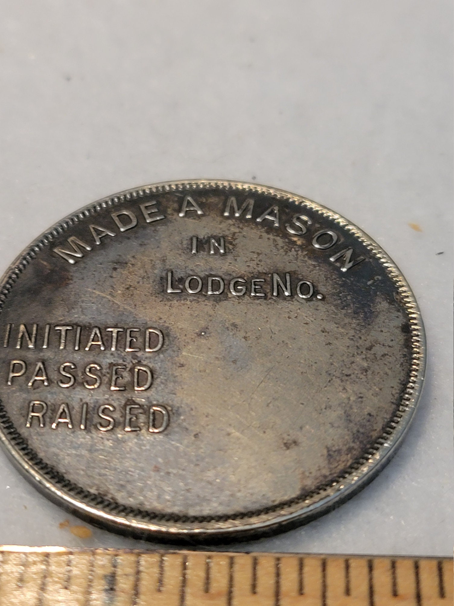 Pair of made A Mason Tokens From the 1920s or Earllier. Weighs 35 Grams