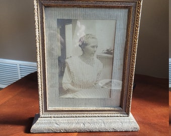 Detailed Floral Wooden Picture Frame with gold tint to it. See pictures for details.