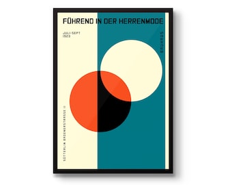 May include: Framed Bauhaus poster with geometric shapes and text. The design features a cream-colored vertical stripe, a teal blue section, and overlapping circles in orange, black, and cream. Text includes "FÜHREND IN DER HERRENMODE" and "Bauhaus".