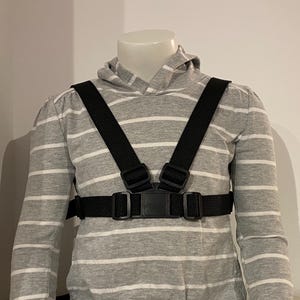 Black SecureMax Walking harness for older children with quick grab handle and leash. For autism, special needs, ADHD, elopment.